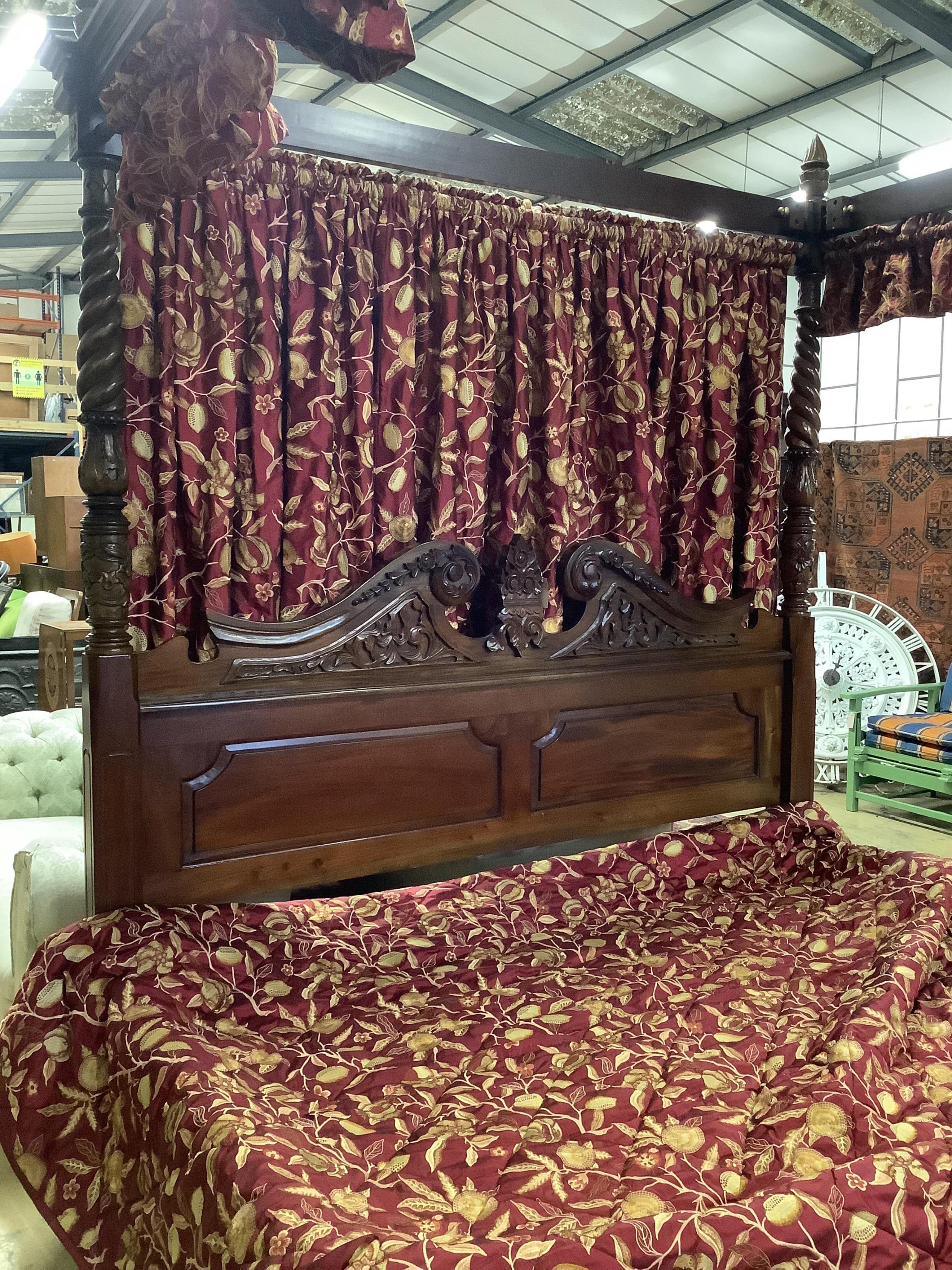 A large George III style mahogany four poster bedframe, width 192cm, length 214cm, height 236cm. Condition - good